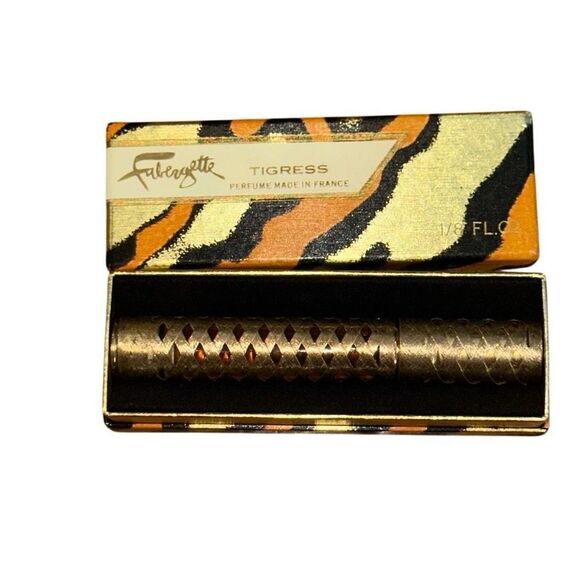 VINTAGE FABERGE FABERGETTE TIGRESS ROLL ON PERFUME 1/8 oz IN GOLDEN CASE FULL - Picture 5 of 10